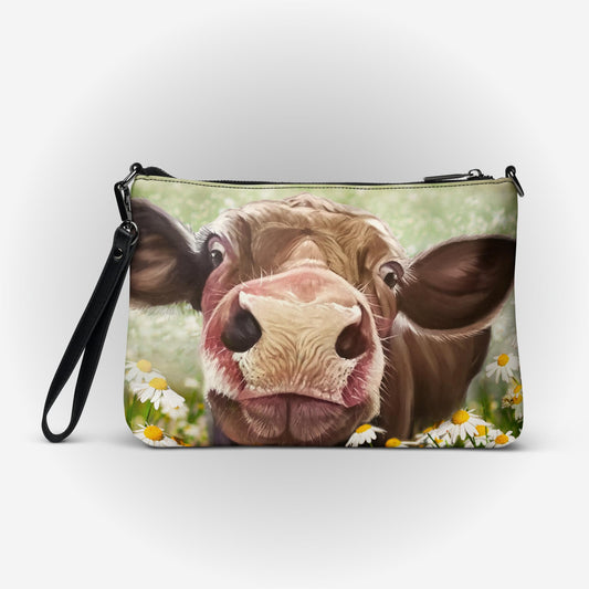 Crossbody bag with 'Camila Cow' on it by Artist Carol Landry